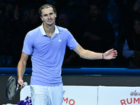 Alexander Zverev (GER) competes against Carlos Alcaraz (ESP) during day six of the Nitto ATP Finals 2024 at Inalpi Arena in Turin, Italy, on...