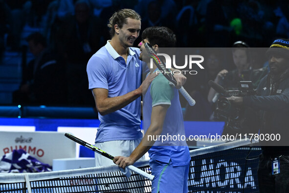 Alexander Zverev (GER) and Carlos Alcaraz (ESP) participate during day six of the Nitto ATP finals 2024 at Inalpi Arena in Turin, Italy, on...