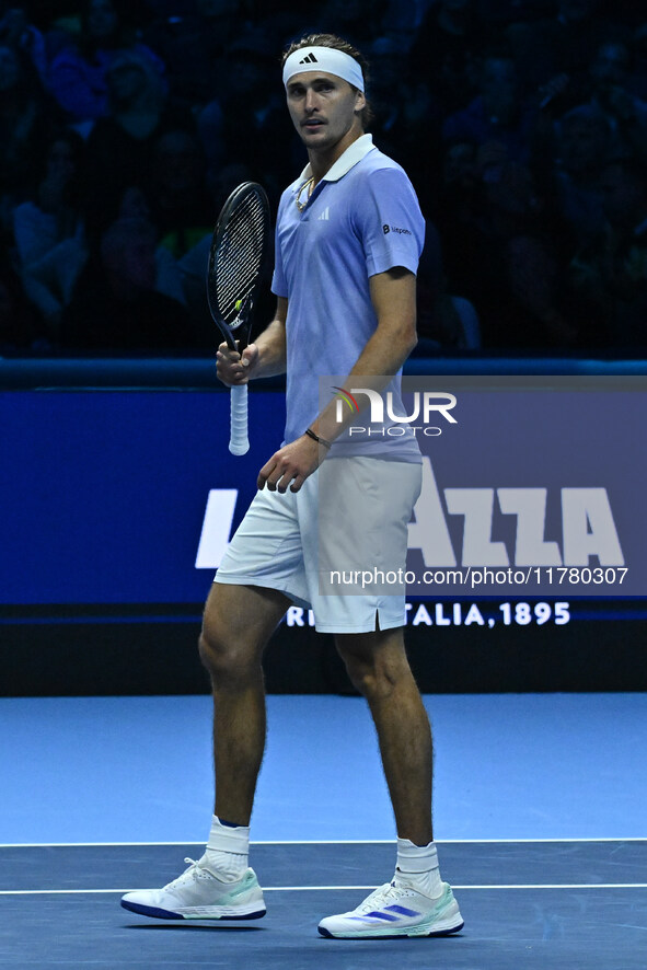 Alexander Zverev (GER) competes against Carlos Alcaraz (ESP) during day six of the Nitto ATP Finals 2024 at Inalpi Arena in Turin, Italy, on...