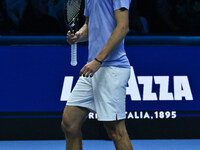 Alexander Zverev (GER) competes against Carlos Alcaraz (ESP) during day six of the Nitto ATP Finals 2024 at Inalpi Arena in Turin, Italy, on...