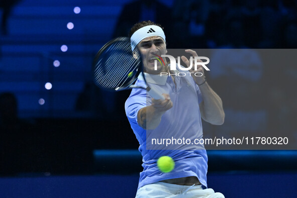 Alexander Zverev (GER) competes against Carlos Alcaraz (ESP) during day six of the Nitto ATP Finals 2024 at Inalpi Arena in Turin, Italy, on...