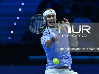 Alexander Zverev (GER) competes against Carlos Alcaraz (ESP) during day six of the Nitto ATP Finals 2024 at Inalpi Arena in Turin, Italy, on...