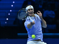 Alexander Zverev (GER) competes against Carlos Alcaraz (ESP) during day six of the Nitto ATP Finals 2024 at Inalpi Arena in Turin, Italy, on...