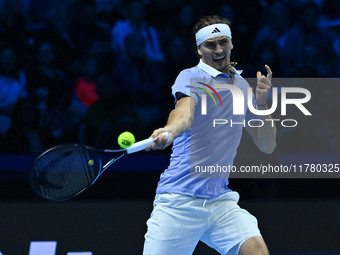 Alexander Zverev (GER) competes against Carlos Alcaraz (ESP) during day six of the Nitto ATP Finals 2024 at Inalpi Arena in Turin, Italy, on...