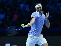 Alexander Zverev (GER) competes against Carlos Alcaraz (ESP) during day six of the Nitto ATP Finals 2024 at Inalpi Arena in Turin, Italy, on...