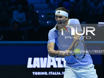 Alexander Zverev (GER) competes against Carlos Alcaraz (ESP) during day six of the Nitto ATP Finals 2024 at Inalpi Arena in Turin, Italy, on...