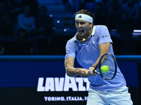 Alexander Zverev (GER) competes against Carlos Alcaraz (ESP) during day six of the Nitto ATP Finals 2024 at Inalpi Arena in Turin, Italy, on...