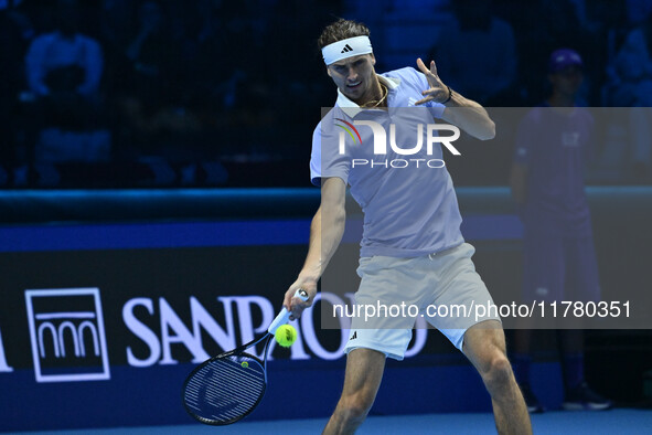 Alexander Zverev (GER) competes against Carlos Alcaraz (ESP) during day six of the Nitto ATP Finals 2024 at Inalpi Arena in Turin, Italy, on...