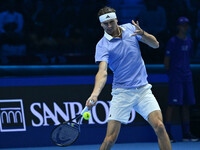 Alexander Zverev (GER) competes against Carlos Alcaraz (ESP) during day six of the Nitto ATP Finals 2024 at Inalpi Arena in Turin, Italy, on...