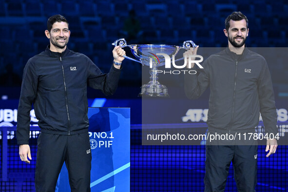 Marcelo Arevalo of El Salvador and Mate Pavic of Croatia celebrate reaching No. 1 in the ATP Doubles rankings on day six of the Nitto ATP Fi...