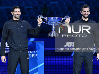 Marcelo Arevalo of El Salvador and Mate Pavic of Croatia celebrate reaching No. 1 in the ATP Doubles rankings on day six of the Nitto ATP Fi...