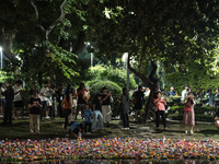 People float Krathong offerings at a park lake during the Thai annual Loy Krathong festival in Bangkok, Thailand, on November 15, 2024. The...