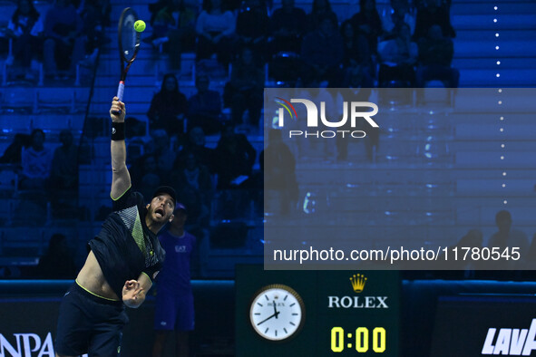 Tim Puetz (GER) plays during the Men's Double match against Rohan Bopanna (IND) and Matthew Ebden (AUS) during day six of the Nitto ATP fina...