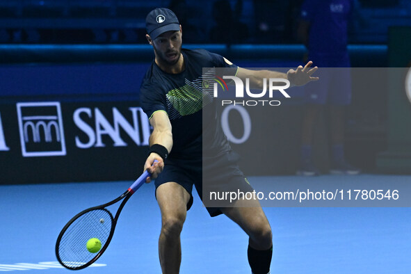 Tim Puetz (GER) plays during the Men's Double match against Rohan Bopanna (IND) and Matthew Ebden (AUS) during day six of the Nitto ATP fina...