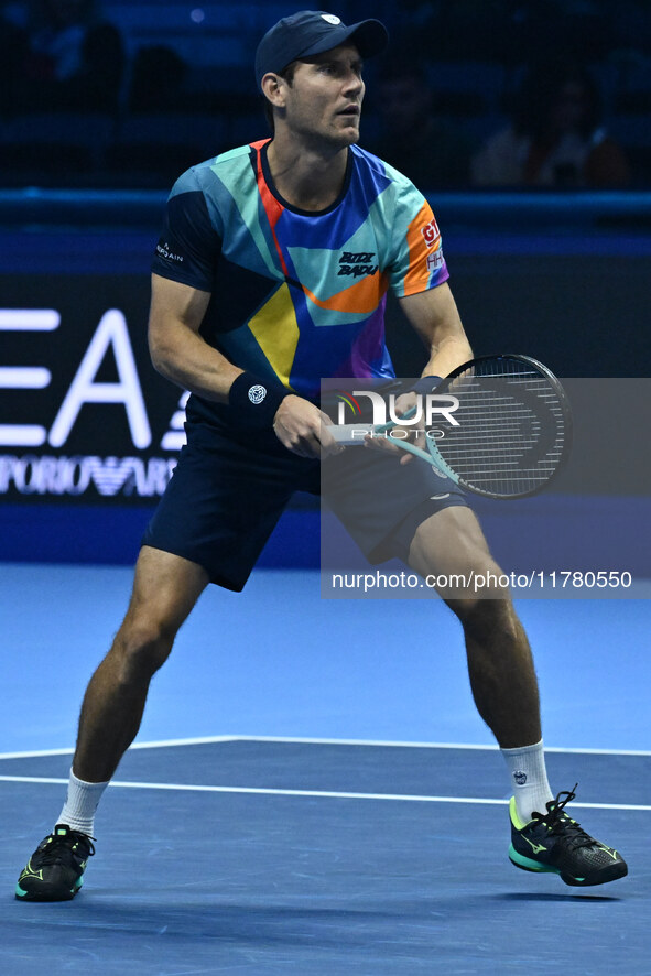 Matthew Ebden (AUS) plays during the Men's Doubles match against Kevin Krawietz (GER) and Tim Puetz (GER) on day six of the Nitto ATP Finals...