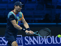 Matthew Ebden (AUS) plays during the Men's Doubles match against Kevin Krawietz (GER) and Tim Puetz (GER) on day six of the Nitto ATP Finals...