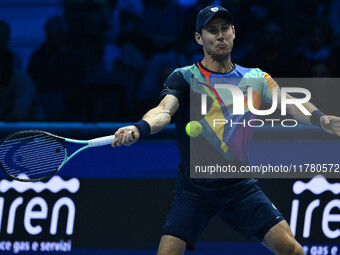 Matthew Ebden (AUS) plays during the Men's Doubles match against Kevin Krawietz (GER) and Tim Puetz (GER) on day six of the Nitto ATP Finals...