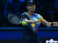 Matthew Ebden (AUS) plays during the Men's Doubles match against Kevin Krawietz (GER) and Tim Puetz (GER) on day six of the Nitto ATP Finals...