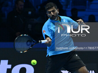 Rohan Bopanna (IND) plays during the Men's Doubles match against Kevin Krawietz (GER) and Tim Puetz (GER) on day six of the Nitto ATP Finals...