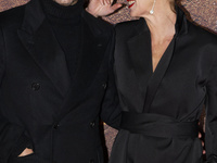 Italian actors Vinicio Marchioni and Milena Mancini walk on the red carpet of the film Il Gladiatore II at the Parco della Musica Auditorium...