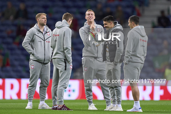 Players of Poland look on before the UEFA Nations League 2024/25 League A Group A1 match between Portugal and Poland at Estadio Do Dragao in...