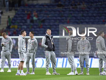 Players of Poland look on before the UEFA Nations League 2024/25 League A Group A1 match between Portugal and Poland at Estadio Do Dragao in...