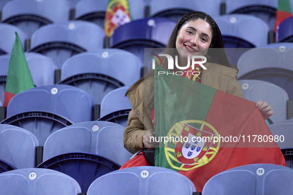 A Portugal fan waits for the start of the UEFA Nations League 2024/25 League A Group A1 match between Portugal and Poland at Estadio Do Drag...