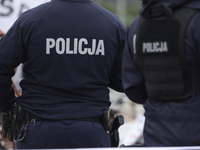 In Warsaw, Poland, on November 10, 2024, police attend the monthly celebrations of the Smolensk disaster at the Monument to the Victims of t...