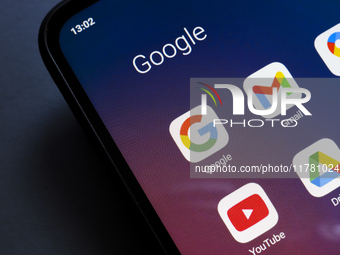 Google, Gmail, Maps, YouTube, and Drive app logos display on the screen of a smartphone in Reno, United States, on November 15, 2024. (