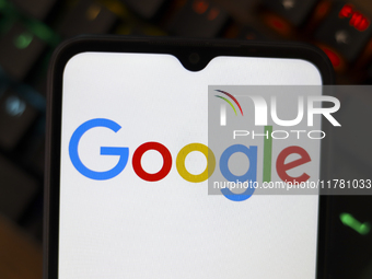 The Google logo displays on a smartphone screen in Reno, United States, on November 15, 2024. (