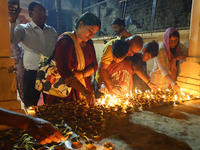 People light earthen lamps at the Shrine Galtaji temple holy pond 'kund' as part of the Deep Mahotsav celebration on the eve of Dev Deepawal...