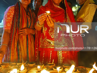 JMC Heritage Mayor Kusum Yadav lights earthen lamps at the Shrine Galtaji temple holy pond 'kund' as part of the Deep Mahotsav celebration o...