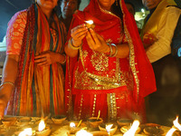 JMC Heritage Mayor Kusum Yadav lights earthen lamps at the Shrine Galtaji temple holy pond 'kund' as part of the Deep Mahotsav celebration o...