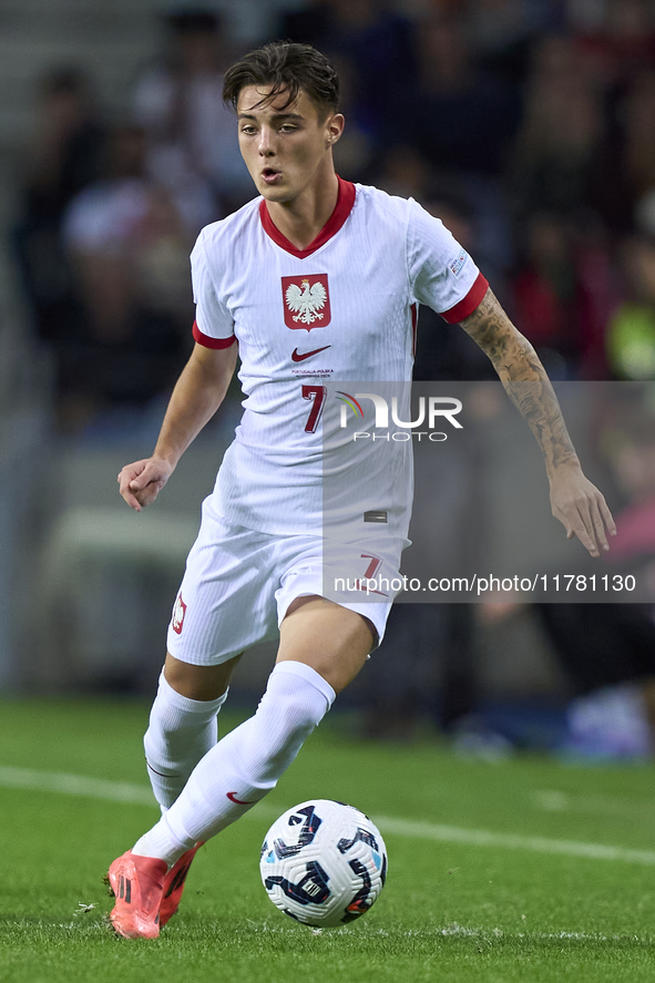 Kacper Urbanski of Poland plays during the UEFA Nations League 2024/25 League A Group A1 match between Portugal and Poland at Estadio Do Dra...