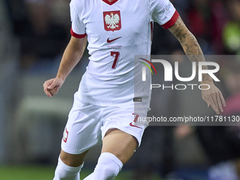 Kacper Urbanski of Poland plays during the UEFA Nations League 2024/25 League A Group A1 match between Portugal and Poland at Estadio Do Dra...