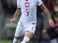 Kacper Urbanski of Poland plays during the UEFA Nations League 2024/25 League A Group A1 match between Portugal and Poland at Estadio Do Dra...