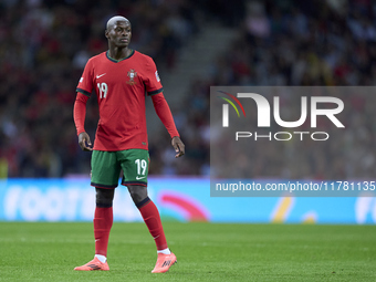 Nuno Mendes of Portugal reacts during the UEFA Nations League 2024/25 League A Group A1 match between Portugal and Poland at Estadio Do Drag...