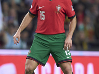 Joao Neves of Portugal plays during the UEFA Nations League 2024/25 League A Group A1 match between Portugal and Poland at Estadio Do Dragao...