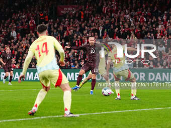 Christian Eriksen of Denmark  shoots on goal during the Nations League Round 5 match between Denmark against Spain at Parken, Copenhagen, De...