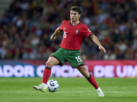 Joao Neves of Portugal is in action during the UEFA Nations League 2024/25 League A Group A1 match between Portugal and Poland at Estadio Do...