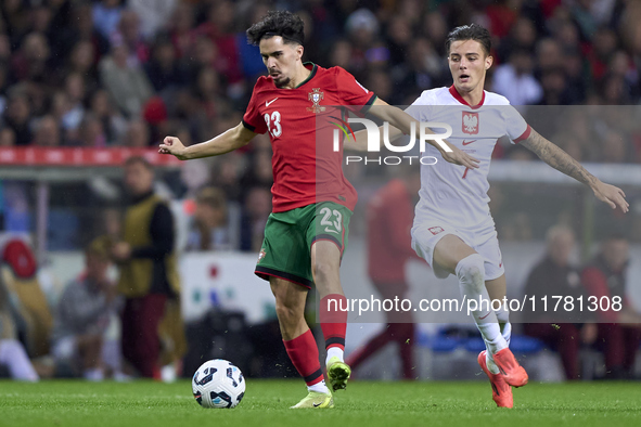 Kacper Urbanski of Poland competes for the ball with Vitor Ferreira 'Vitinha' of Portugal during the UEFA Nations League 2024/25 League A Gr...