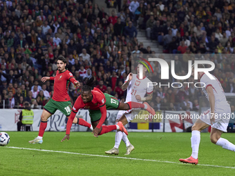 Rafael Leao of Portugal heads the ball and scores his team's first goal during the UEFA Nations League 2024/25 League A Group A1 match betwe...