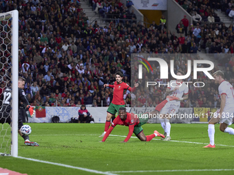 Rafael Leao of Portugal heads the ball and scores his team's first goal during the UEFA Nations League 2024/25 League A Group A1 match betwe...