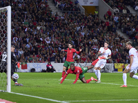 Rafael Leao of Portugal heads the ball and scores his team's first goal during the UEFA Nations League 2024/25 League A Group A1 match betwe...