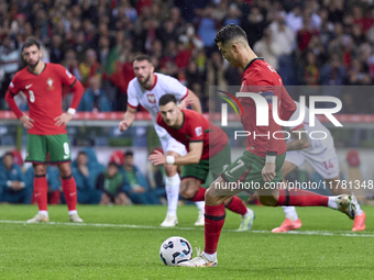 Cristiano Ronaldo of Portugal shoots a penalty and scores his team's second goal during the UEFA Nations League 2024/25 League A Group A1 ma...