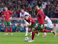 Cristiano Ronaldo of Portugal shoots a penalty and scores his team's second goal during the UEFA Nations League 2024/25 League A Group A1 ma...