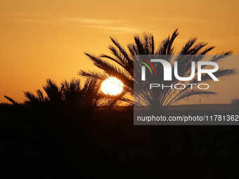 The photo, taken in Oued Souf, Algeria, on November 15, 2024, shows a sunset during the 6th International Saharan Tourism Festival (FITS). O...