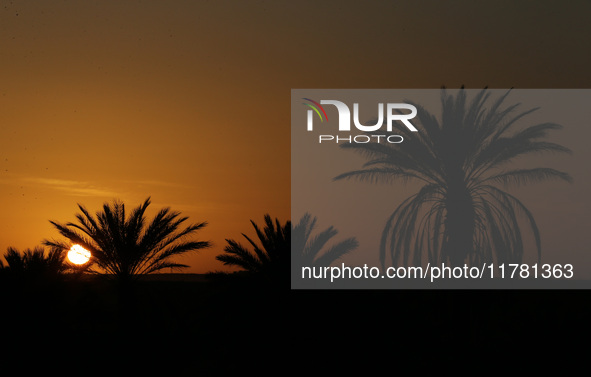 The photo, taken in Oued Souf, Algeria, on November 15, 2024, shows a sunset during the 6th International Saharan Tourism Festival (FITS). O...