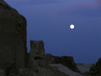 A photo taken in Oued Souf, Algeria, on November 15, 2024, shows a full moon during the 6th International Saharan Tourism Festival (FITS). O...