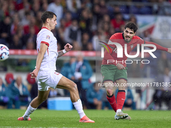 Pedro Neto of Portugal shoots on goal during the UEFA Nations League 2024/25 League A Group A1 match between Portugal and Poland at Estadio...